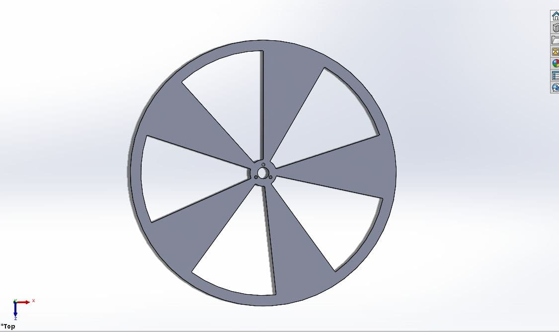 SolidWorks model of a simple practice disk with six wedge cutouts.